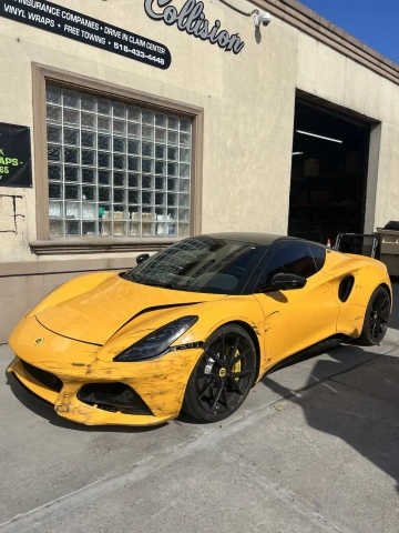 auto body repair before photo of exotic yellow car