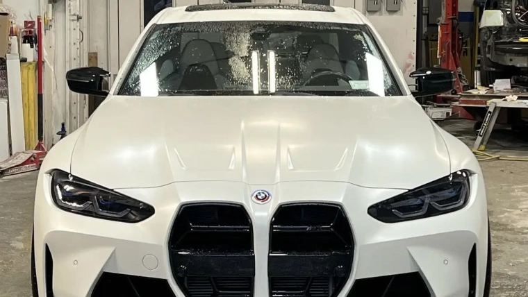 White BMW auto body repair and window tinting